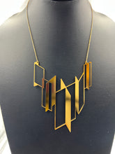 #1 statement necklace gold
